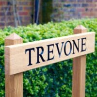Personalised-wooden-house-sign-on-posts