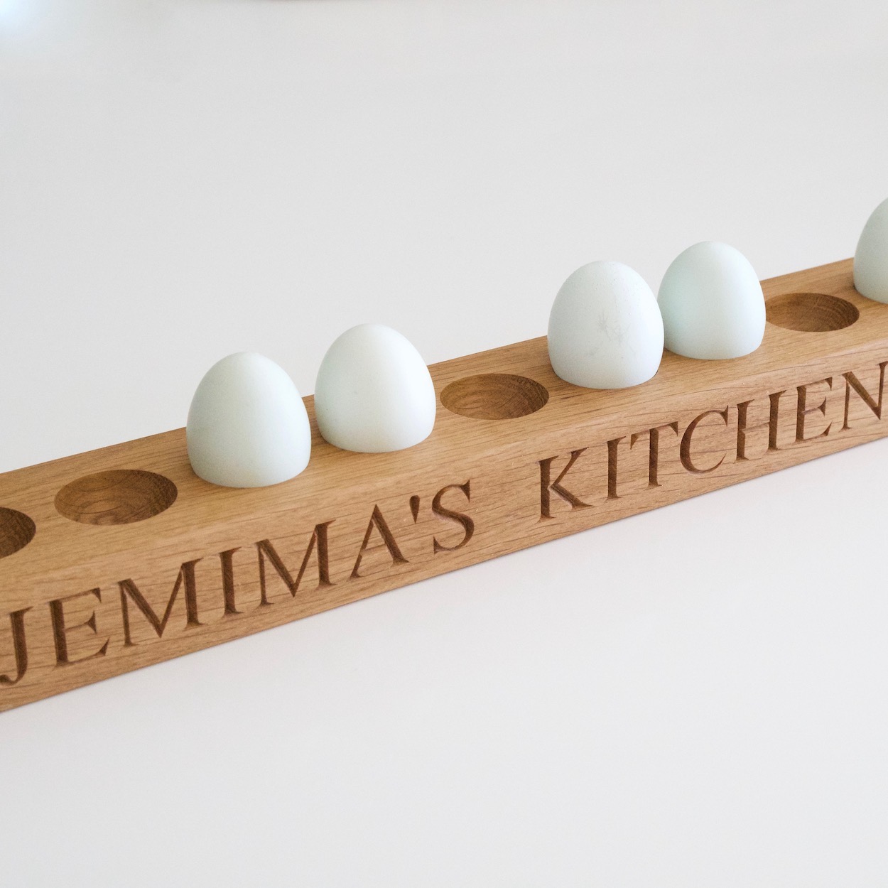 engraved-wooden-wall-egg-rack