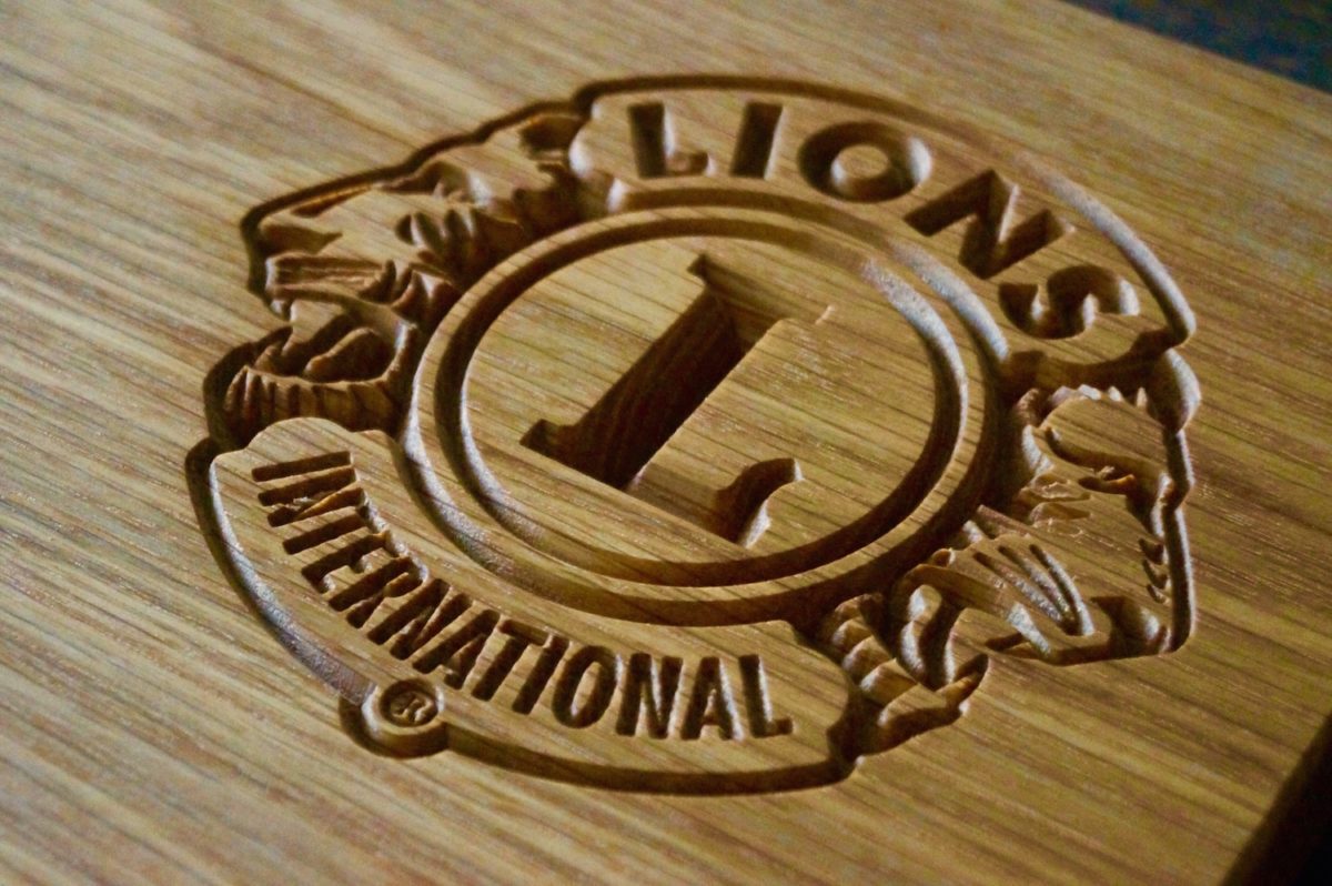 wooden business sign