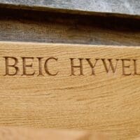 engraved-wooden-wall-bike-rack